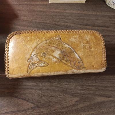 LEATHER LURE BOOK FULL OF FISHING LURES