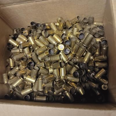 PARTIAL BOX OF 45's BRASS