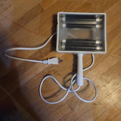 Sale Photo Thumbnail #428: As pictured,  I believe it's to see skin issues but has a multitude of uses. See photos, one edge of cover is broken but it still stays on