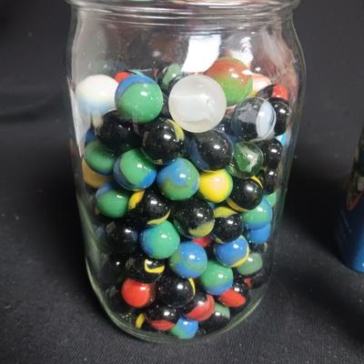 100 COLORFUL MARBLES IN A TIN AND A JAR OF MARBLES