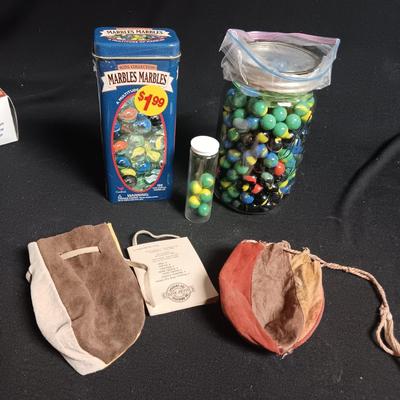 100 COLORFUL MARBLES IN A TIN AND A JAR OF MARBLES