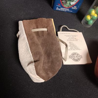 100 COLORFUL MARBLES IN A TIN AND A JAR OF MARBLES