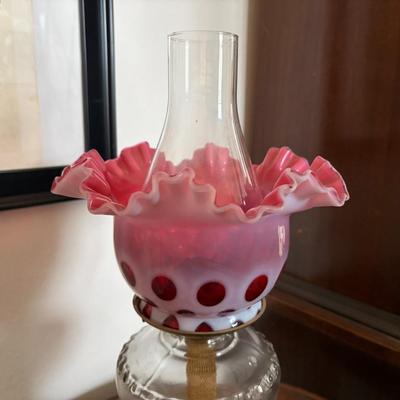 Hurricane lamp with pink Fenton ruffled shade