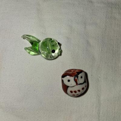 Sale Photo Thumbnail #100: Blown glass fishy & gorgeous hand created owl. Both are adorable & about the size of a penny, as shown