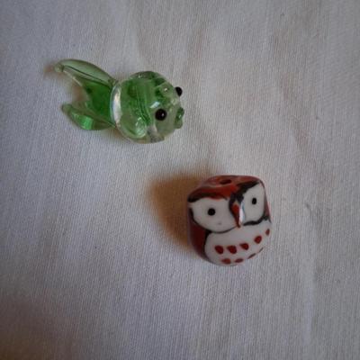 Sale Photo Thumbnail #99: Blown glass fishy & gorgeous hand created owl. Both are adorable & about the size of a penny, as shown