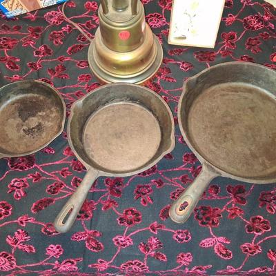 Sale Photo Thumbnail #120: 3 different sizes & makers. All in cooking condition.  Needs to be cleaned before cooking.