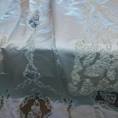 Sale Photo Thumbnail #140: Size 8 two piece gown. Dress with removable train. Gorgeous,  preserved after 1 wear & in excellent condition.  Michelangelo Gown, original price $2999

You can make arrangements to come in & try gowns on. Please message for appointments