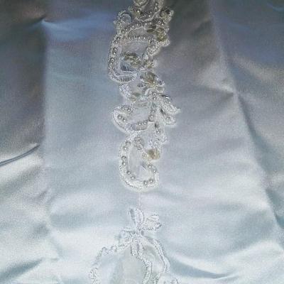 Sale Photo Thumbnail #146: Size 8 two piece gown. Dress with removable train. Gorgeous,  preserved after 1 wear & in excellent condition.  Michelangelo Gown, original price $2999

You can make arrangements to come in & try gowns on. Please message for appointments