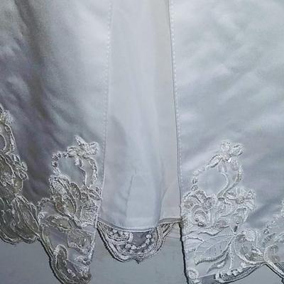 Sale Photo Thumbnail #152: Size 8 two piece gown. Dress with removable train. Gorgeous,  preserved after 1 wear & in excellent condition.  Michelangelo Gown, original price $2999

You can make arrangements to come in & try gowns on. Please message for appointments