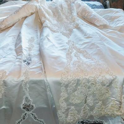 Sale Photo Thumbnail #133: Size 8 two piece gown. Dress with removable train. Gorgeous,  preserved after 1 wear & in excellent condition.  Michelangelo Gown, original price $2999

You can make arrangements to come in & try gowns on. Please message for appointments