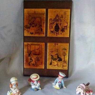 Sale Photo Thumbnail #157: 1960/1970 Wall Plaque & later 20th century Holly Hobbie figurines. All in great shape. Plexiglass over small prints is discolored with age & could use new ones. All others in excellent condition 4 figurines included.