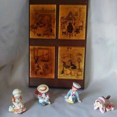 Sale Photo Thumbnail #158: 1960/1970 Wall Plaque & later 20th century Holly Hobbie figurines. All in great shape. Plexiglass over small prints is discolored with age & could use new ones. All others in excellent condition 4 figurines included.
