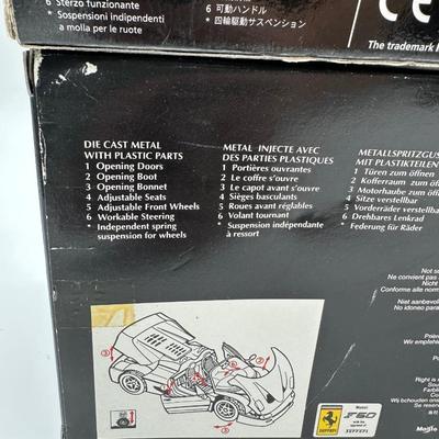 2) Maisto Special Edition 1:18 Diecast Cars – Ferrari F50 & 1996 Corvette (Boxed)
