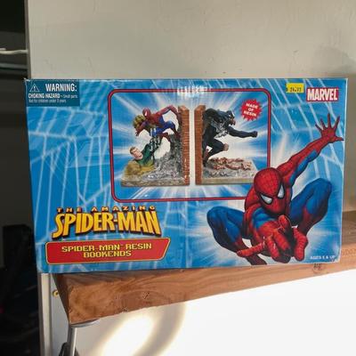 Spider-Man resin bookends featuring Spider-Man, Venom, and Sandman.