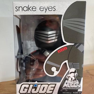 +5 This is a Hasbro G.I. Joe Mighty Muggs Snake Eyes vinyl figure