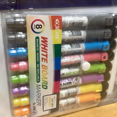 small whiteboard set with magnets and markers