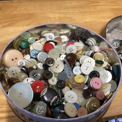 tin full of buttons and a few misc. sewing items