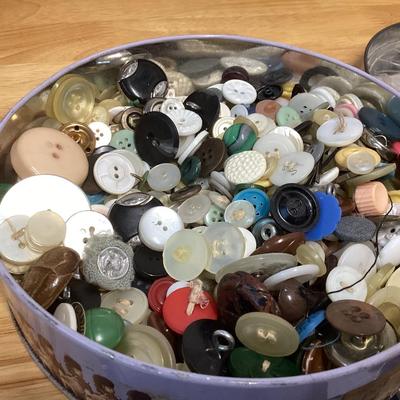 tin full of buttons and a few misc. sewing items