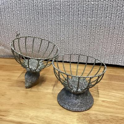 small gray distressed metal decorative bird cage cloche with a bird finial