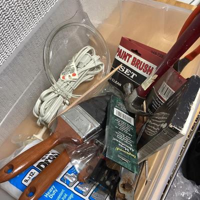 caulk gun, paint brushes, drop cloth and other items