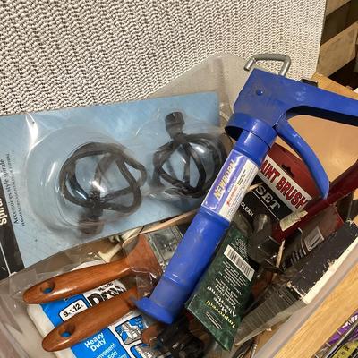 caulk gun, paint brushes, drop cloth and other items