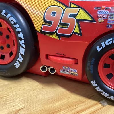  Disney Pixar Cars Lightning McQueen CD player and AM/FM boombox radio.  No cord- works with batteries