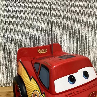  Disney Pixar Cars Lightning McQueen CD player and AM/FM boombox radio.  No cord- works with batteries