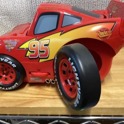  Disney Pixar Cars Lightning McQueen CD player and AM/FM boombox radio.  No cord- works with batteries