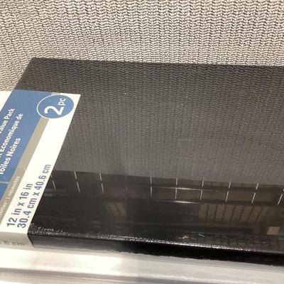 bundle of various sizes of stretched canvases new in packages