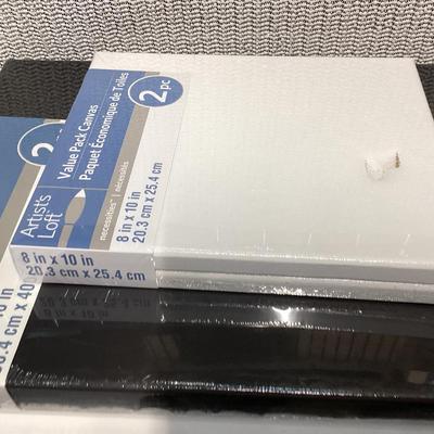 bundle of various sizes of stretched canvases new in packages