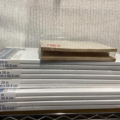 bundle of various sizes of stretched canvases new in packages