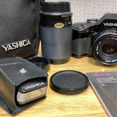 vintage Yashica camera and accessories