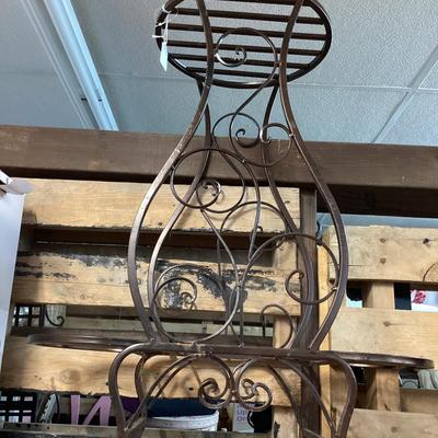 Metal plant stand- you're looking up at it in this photo