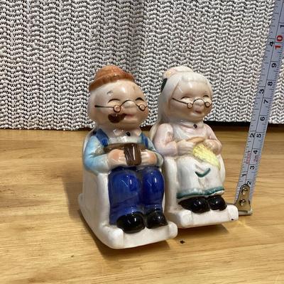 Vintage grandma and grandpa couple seated in rocking chairs salt and pepper shakers