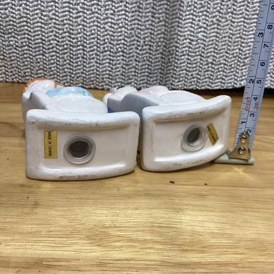 Vintage grandma and grandpa couple seated in rocking chairs salt and pepper shakers