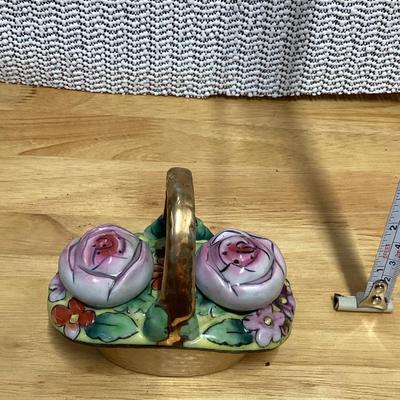 Vintage porcelain shoe with woman and children