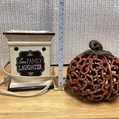 Ceramic wax warmer and a decorative pottery pumpkin
