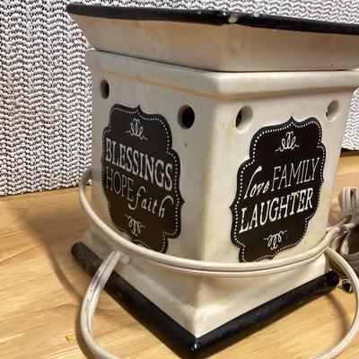 Ceramic wax warmer and a decorative pottery pumpkin