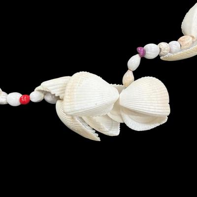 Sale Photo Thumbnail #25: Vintage Polynesian or Tahitian Shell Necklace Lei
See Photo for size