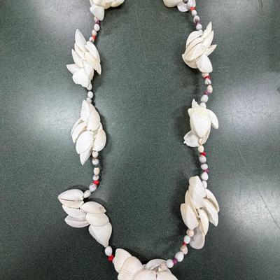Sale Photo Thumbnail #27: Vintage Polynesian or Tahitian Shell Necklace Lei
See Photo for size