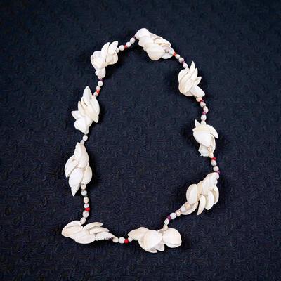 Sale Photo Thumbnail #26: Vintage Polynesian or Tahitian Shell Necklace Lei
See Photo for size