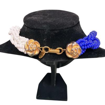 Sale Photo Thumbnail #37: Les Bernard Blue and White Beaded Torsade Necklace
See Photo for size