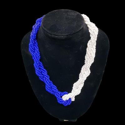 Sale Photo Thumbnail #39: Les Bernard Blue and White Beaded Torsade Necklace
See Photo for size