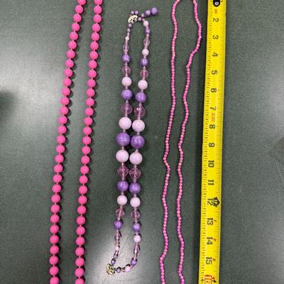 Sale Photo Thumbnail #41: Vintage Pink and Purple Resin Beaded Necklaces Set of 3
Costume jewelry potentially from the 1960's or 70's