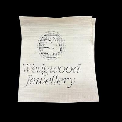 Sale Photo Thumbnail #64: Vintage Wedgwood Jasperware Cameo Brooch in Pale Blue and White Color with Raised Relief Scene Set in a gold tone frame.  Includes Box