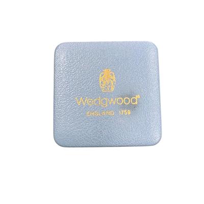 Sale Photo Thumbnail #63: Vintage Wedgwood Jasperware Cameo Brooch in Pale Blue and White Color with Raised Relief Scene Set in a gold tone frame.  Includes Box