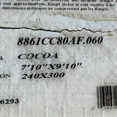 Lot 16 Brown scroll work rug