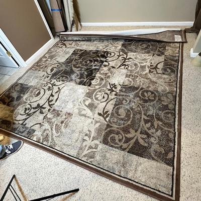 Lot 16 Brown scroll work rug