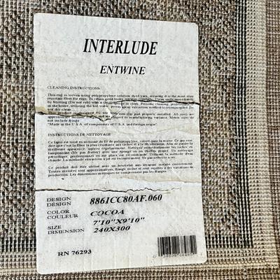 Lot 16 Brown scroll work rug