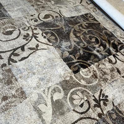 Lot 16 Brown scroll work rug